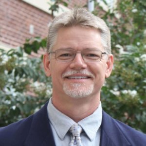 Headshot of Mark Woodford.